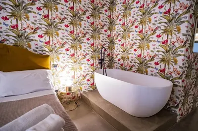 Letto o letti in una camera di CHARME Catania Central Suites