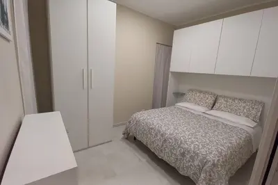 Letto o letti in una camera di Casa vacanza Al Cortiletto