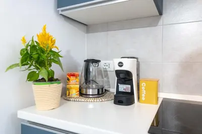 Set per la preparazione di tè e caffè presso Regina Damarete Ortigia Boutique Apartment