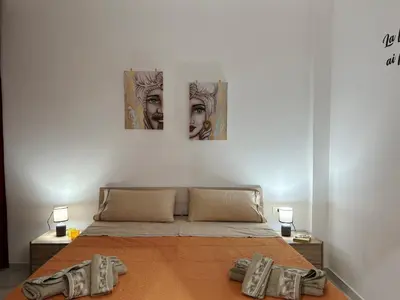 Letto o letti in una camera di Nonno 'nzinu 150 meters from the sandy beach with wifi