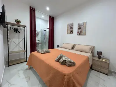 Letto o letti in una camera di Nonno 'nzinu 150 meters from the sandy beach with wifi