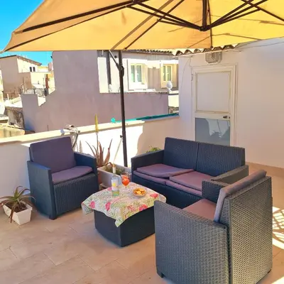 Area soggiorno di Casa Eunice di Ortigia