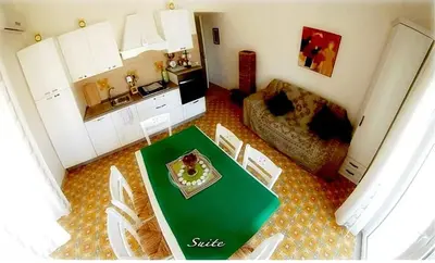 Cucina o angolo cottura di Casa Tramonto sull' Isola