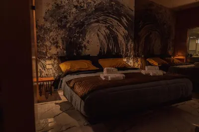 Letto o letti in una camera di Ortigia Sitari suites