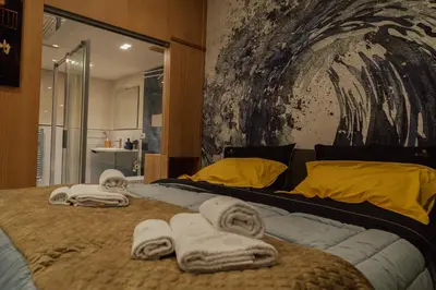 Letto o letti in una camera di Ortigia Sitari suites