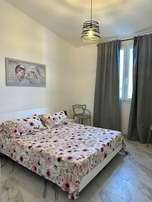 Letto o letti in una camera di Villa Genvic