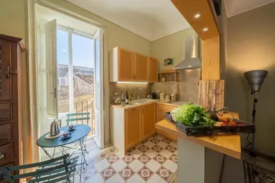 Cucina o angolo cottura di Residenza Mistral Ortigia a 2 passi dal mare