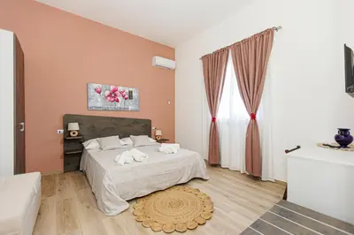 Letto o letti in una camera di La Rosa di Sharon