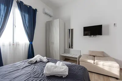 Letto o letti in una camera di La Rosa di Sharon