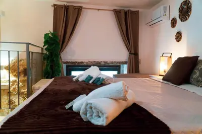 Letto o letti in una camera di Casa Marilu’