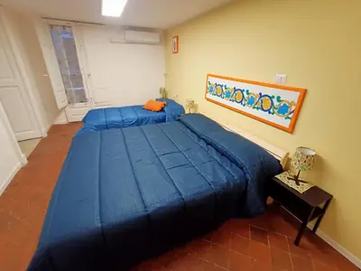 Letto o letti in una camera di Cuntintizza Family House