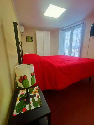 Letto o letti in una camera di Cuntintizza Family House