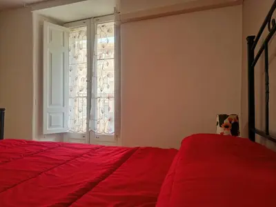 Letto o letti in una camera di Cuntintizza Family House