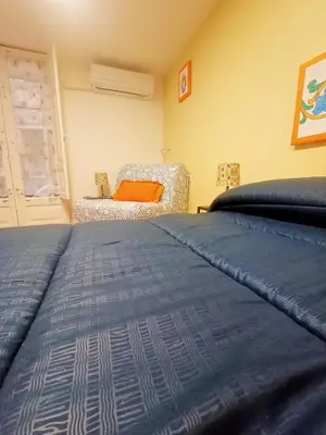 Letto o letti in una camera di Cuntintizza Family House