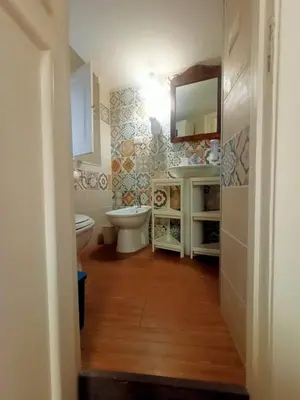 Letto o letti in una camera di Cuntintizza Family House