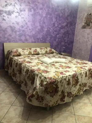 Letto o letti in una camera di Casa Amici Miei