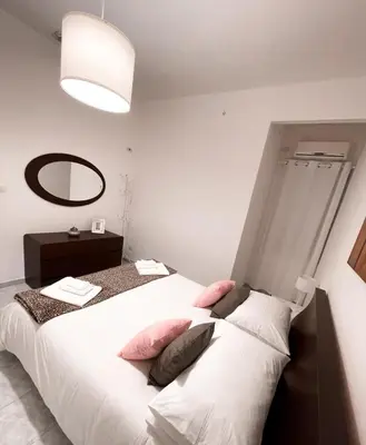 Letto o letti in una camera di Il giaciglio di Alfeo
