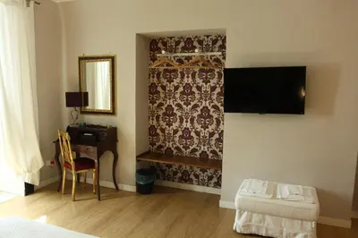 TV o dispositivi per l'intrattenimento presso B&B Suite Cutelli