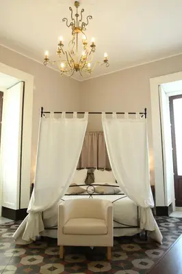 Letto o letti in una camera di B&B Suite Cutelli