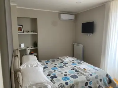 Letto o letti in una camera di B&B Suite Cutelli