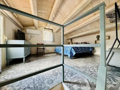 Letto o letti in una camera di La Casa d'Ilà