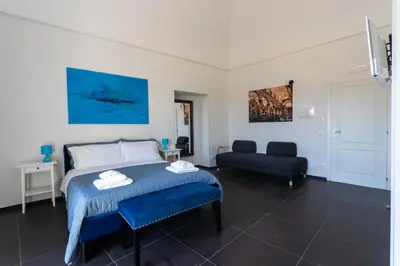 Letto o letti in una camera di Bed and Breakfast Terra del Sole Ibla