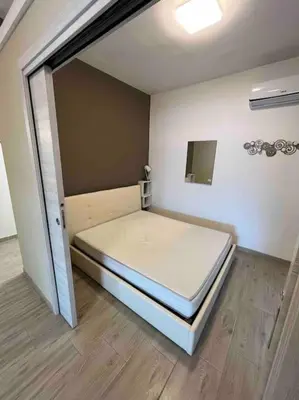 Letto o letti in una camera di Appartamento vista mare
