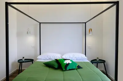 Letto o letti in una camera di Ama Casa Siracusa