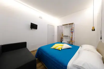 Letto o letti in una camera di Ama Casa Siracusa