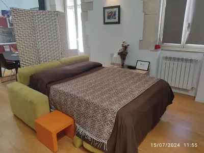 Letto o letti in una camera di Casa Montegrappa