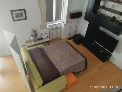 Letto o letti in una camera di Casa Montegrappa