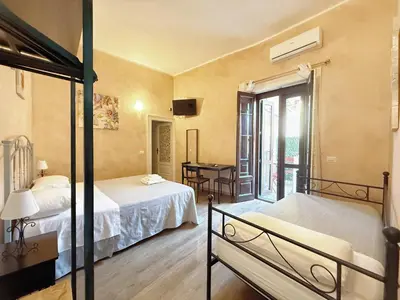 Letto o letti in una camera di Chrilu house