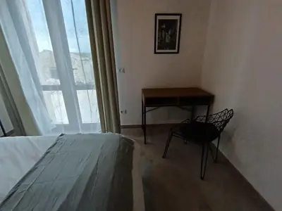 Letto o letti in una camera di PEACE ROOMS