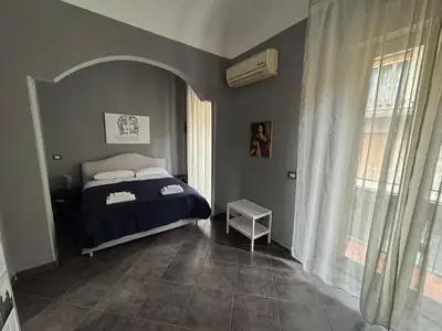 Letto o letti in una camera di Etna charme apartment