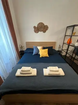 Letto o letti in una camera di Etna charme apartment