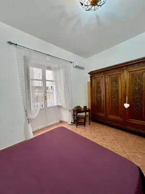Letto o letti in una camera di Casa del Duomo