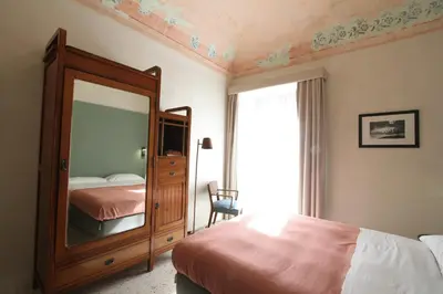 Letto o letti in una camera di Tre Vie apARTment 80