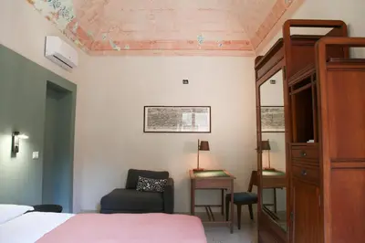 Letto o letti in una camera di Tre Vie apARTment 80
