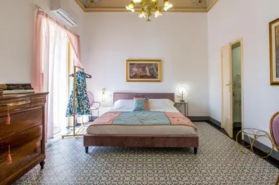 Letto o letti in una camera di Palazzo D'Arte - Luxury Home - Ragusa Centro