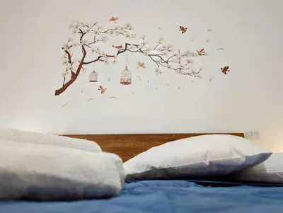 Letto o letti in una camera di MAGi house