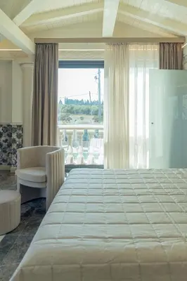 Letto o letti in una camera di Thalos boutique home