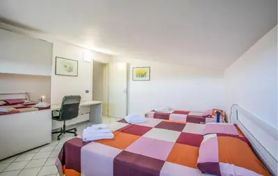 Letto o letti in una camera di 3 Bedroom Cozy Home In Rosolini