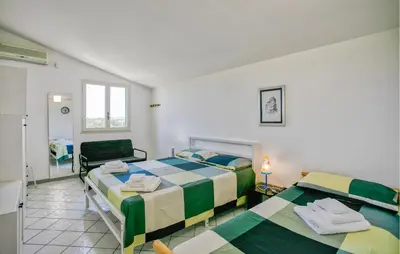 Letto o letti in una camera di 3 Bedroom Cozy Home In Rosolini