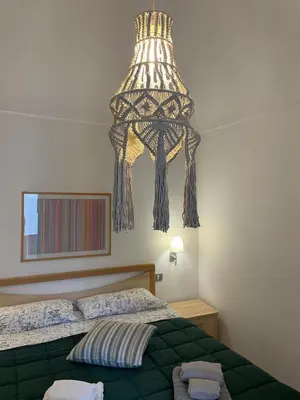 Letto o letti in una camera di Casa Pupidda