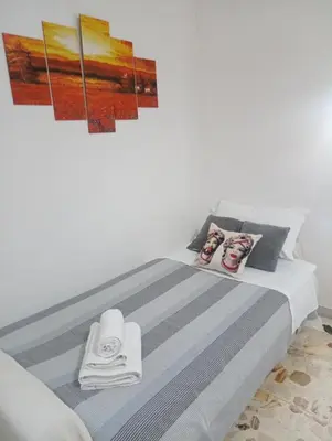 Letto o letti in una camera di Stairway to Etna 1