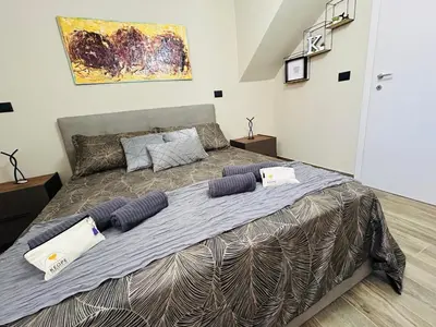 Letto o letti in una camera di Keope Urban Suite