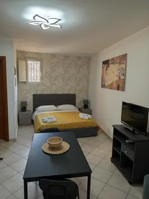 Letto o letti in una camera di Le Case del Cortile