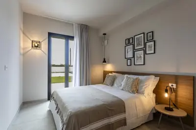 Letto o letti in una camera di ISULATRAVEL - VIlla Giufra