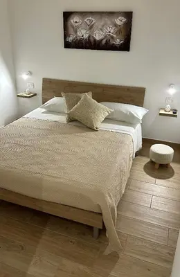 Letto o letti in una camera di Cuor di Noto