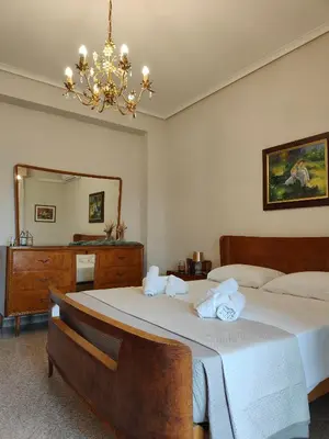 Letto o letti in una camera di Il Canto di Dafni, appartamento storico a Siracusa